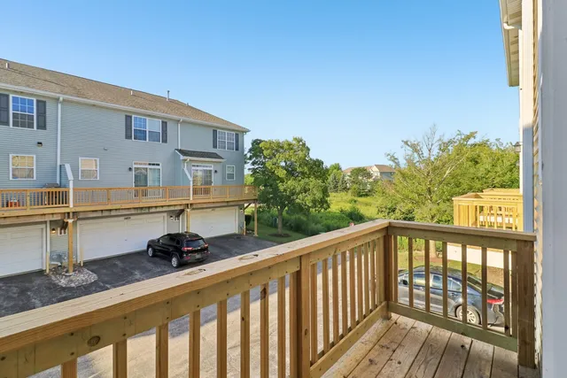 a balcony view with a garden space