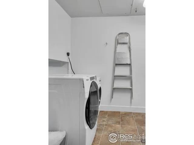 a bathroom with a toilet and a vanity