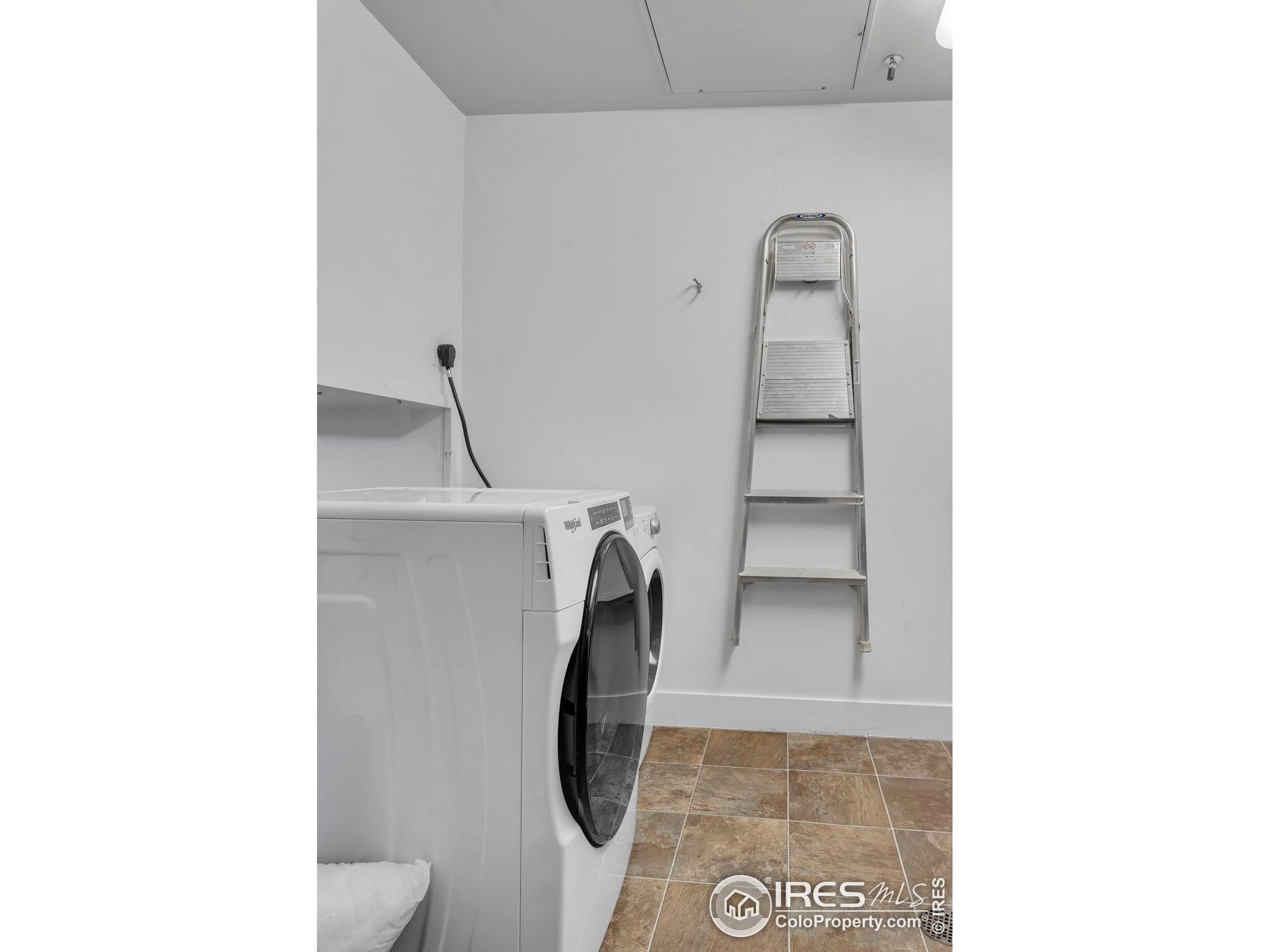 3301 Arapahoe Avenue, Unit 405 Boulder, CO 80303 - Photo 15 of 36 a bathroom with a toilet and a vanity