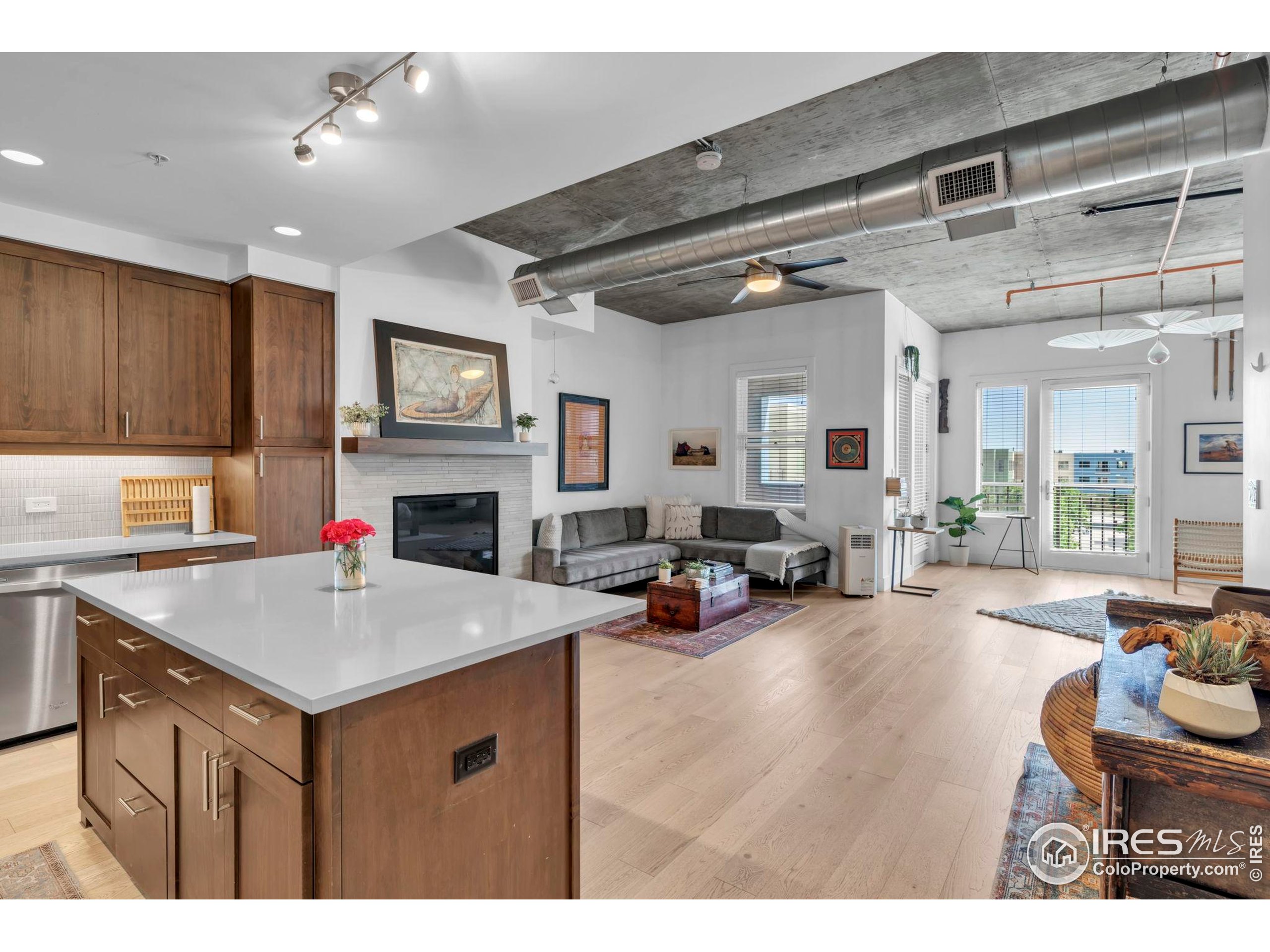 3301 Arapahoe Avenue, Unit 405 Boulder, CO 80303 - Photo 10 of 36 a view of living room and kitchen