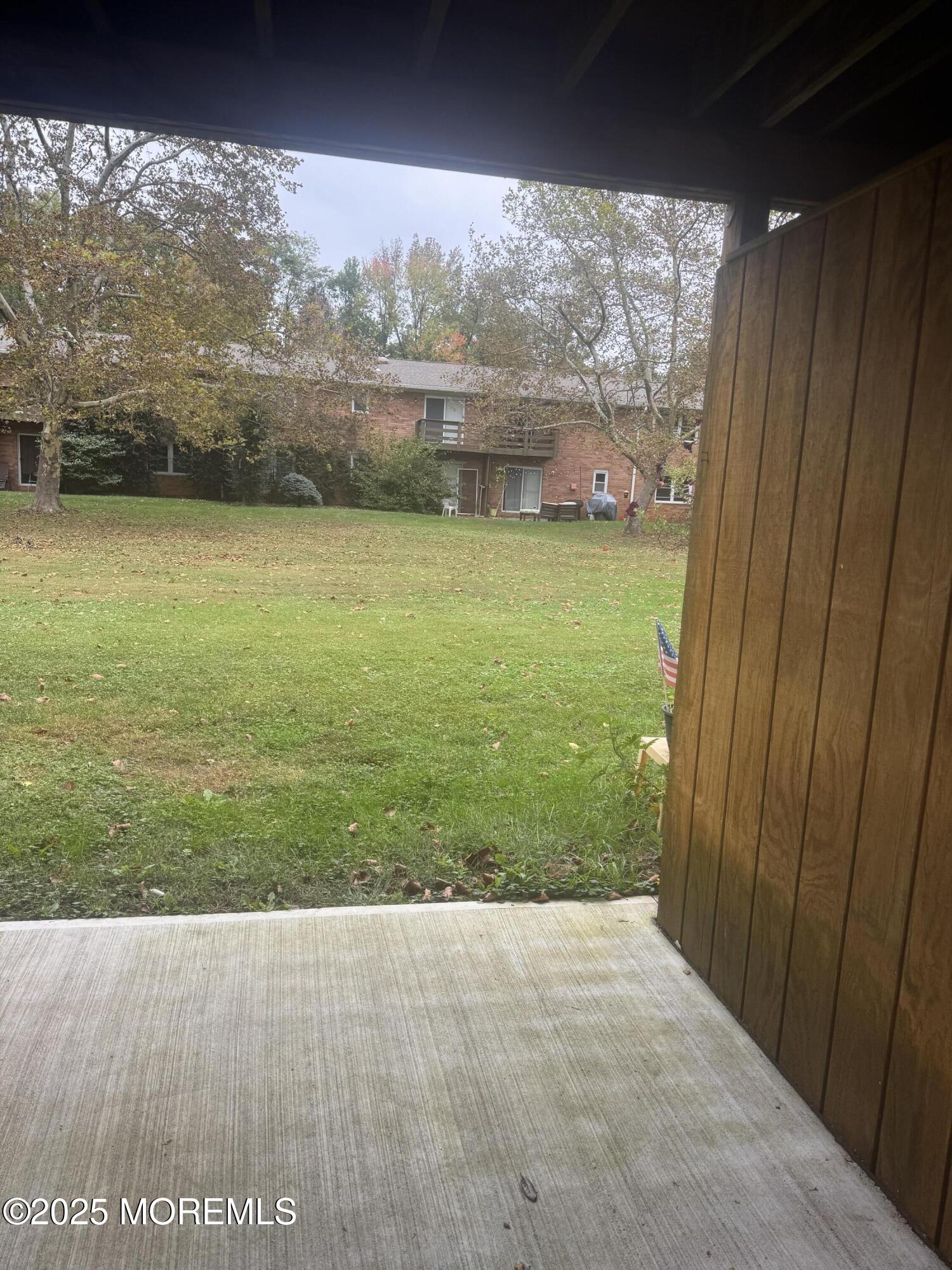96 East Avenue, Unit 65 Atlantic Highlands, NJ 07716 - Photo 6 of 13 a view of a garden from a room