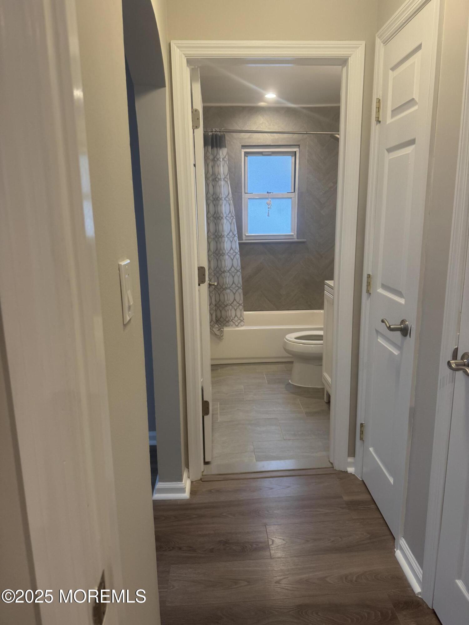 96 East Avenue, Unit 65 Atlantic Highlands, NJ 07716 - Photo 10 of 13 a view of bathroom with a toilet and a shower