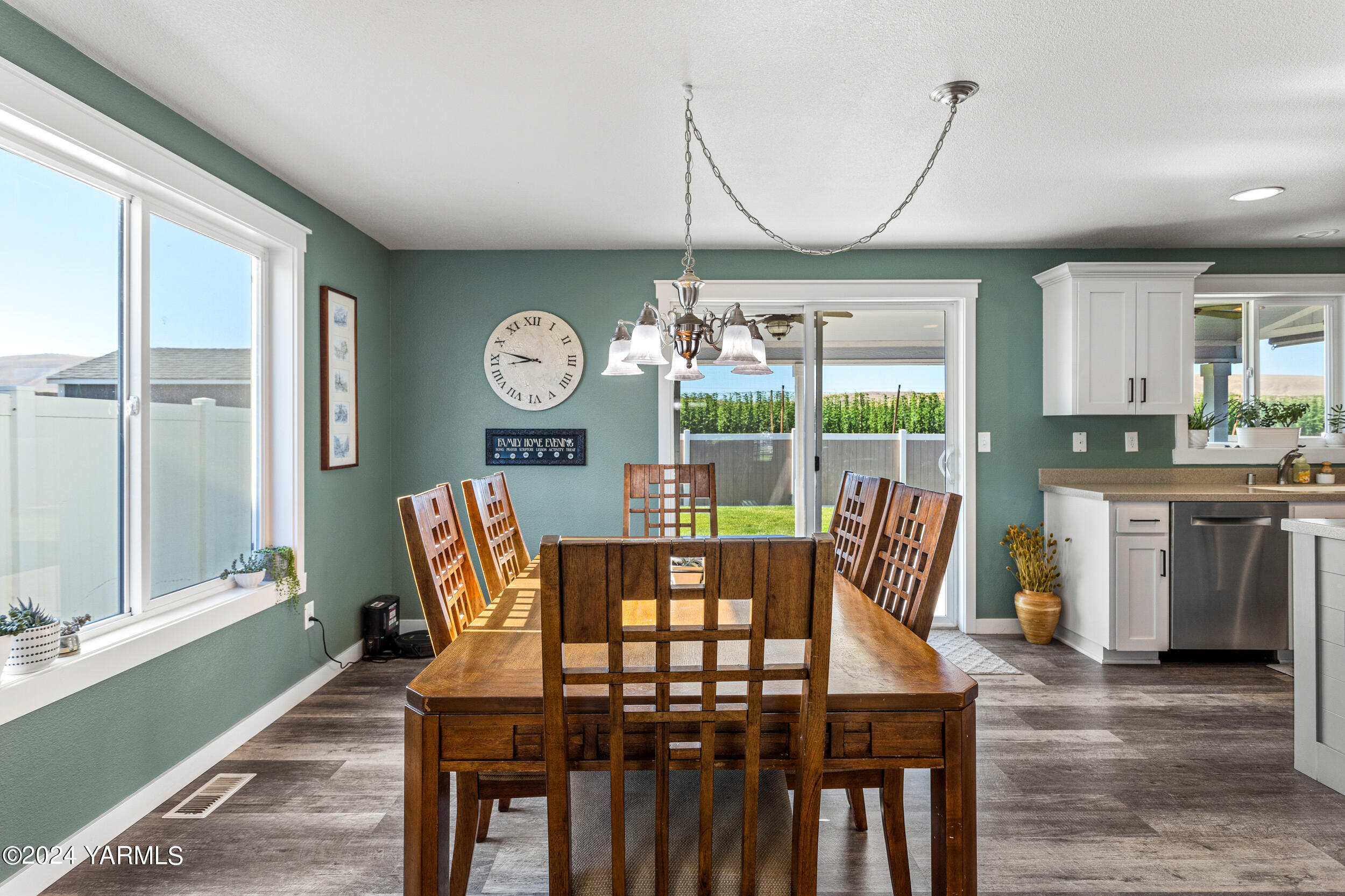 810 Millenium Avenue Moxee, WA 98936 - Photo 6 of 38 a view of a dining room with furniture window and wooden floor