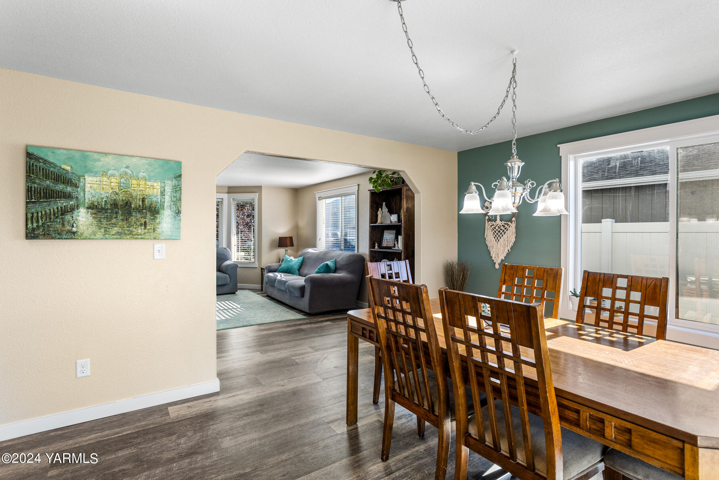 810 Millenium Avenue Moxee, WA 98936 - Photo 8 of 38 a view of a dining room with furniture window and wooden floor