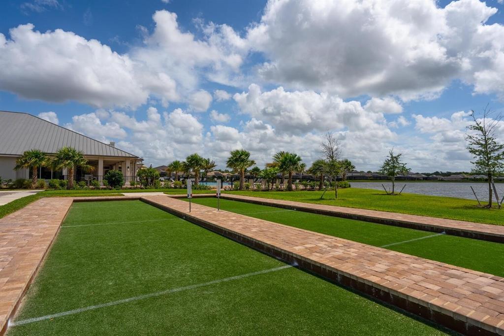 17025 Polo Trail Bradenton, FL 34211 - Photo 24 of 25 a view of a golf course with a lake