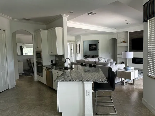 a view of a living room and dining room