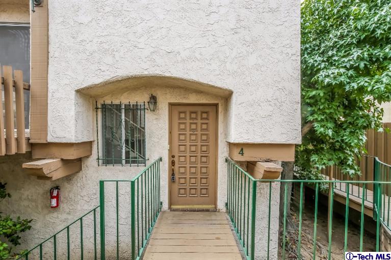 841 West Duarte Road, Unit 4 Arcadia, CA 91007 - Photo 3 of 25 a front view of a house with parking area