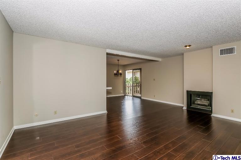 841 West Duarte Road, Unit 4 Arcadia, CA 91007 - Photo 5 of 25 a view of empty room with wooden floor