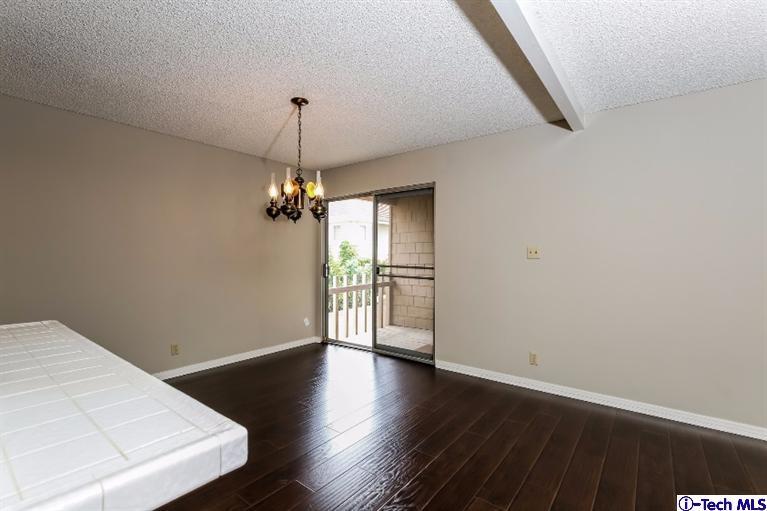 841 West Duarte Road, Unit 4 Arcadia, CA 91007 - Photo 8 of 25 wooden floor in an empty room with a window