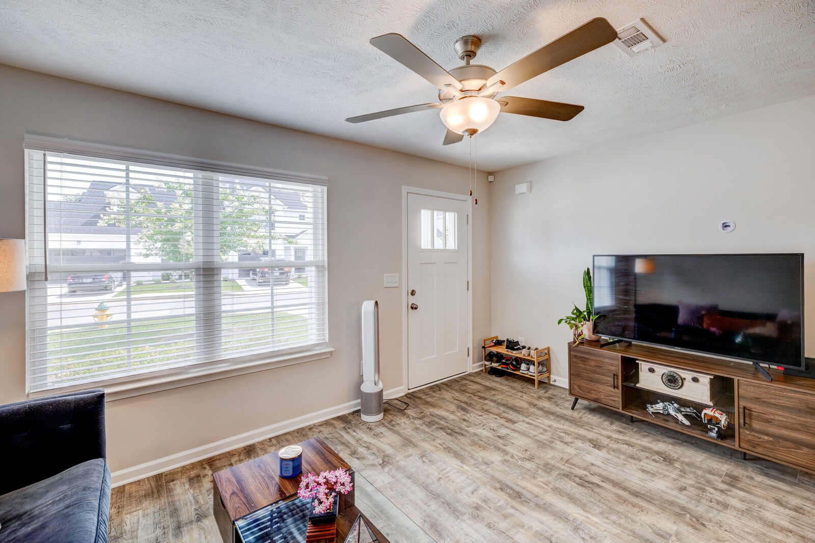3406 Learning Lane Murfreesboro, TN 37128 - Photo 11 of 32 a living room with furniture and a flat screen tv