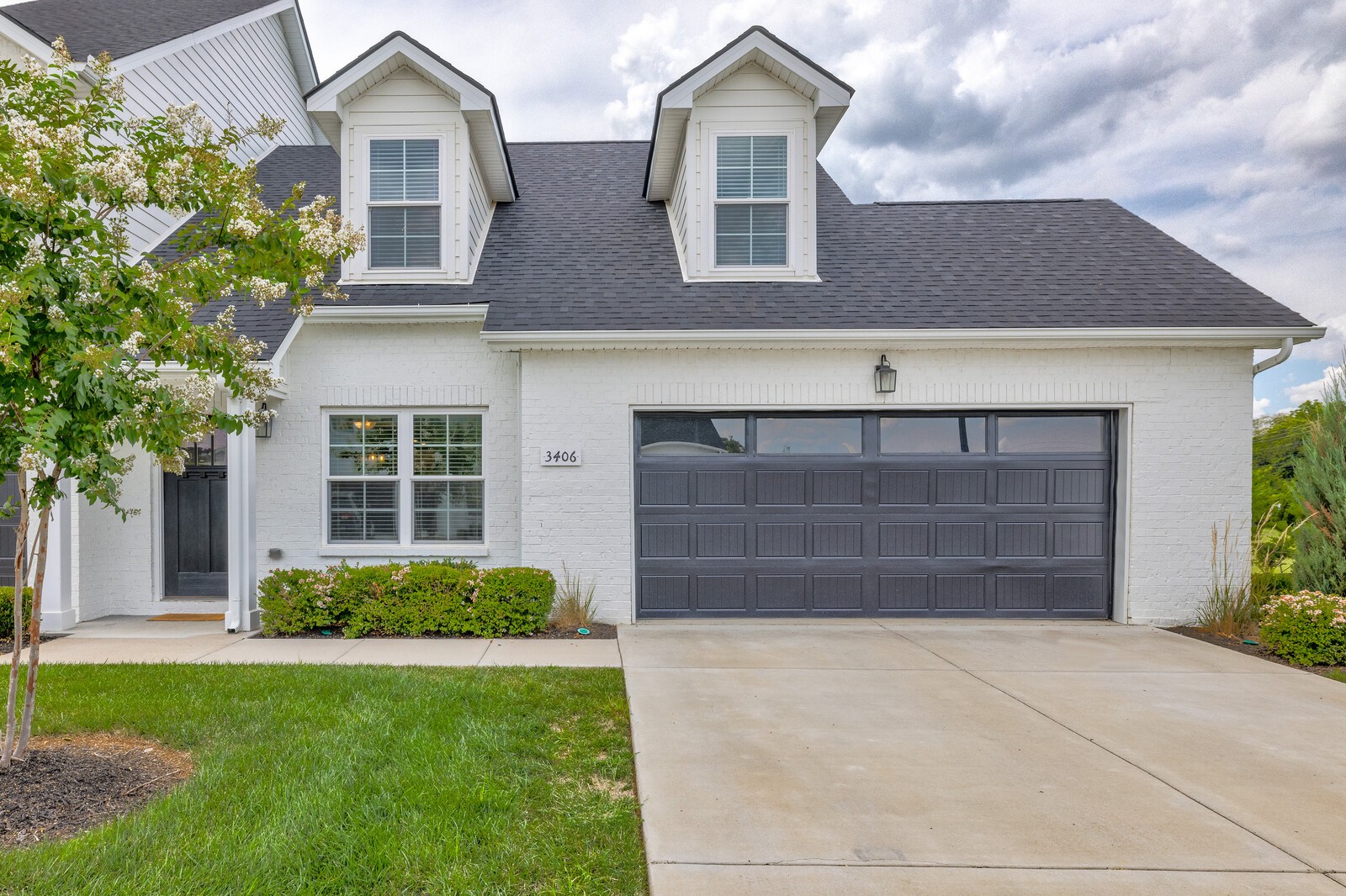 3406 Learning Lane Murfreesboro, TN 37128 - Photo 4 of 32 a front view of a house with garden