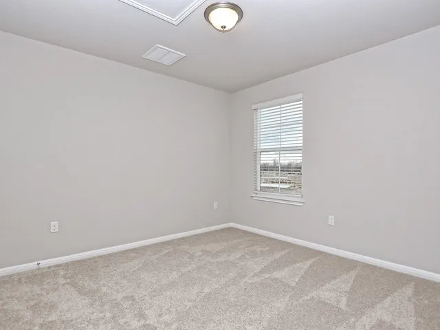 a bathroom with a toilet a sink and bathtub