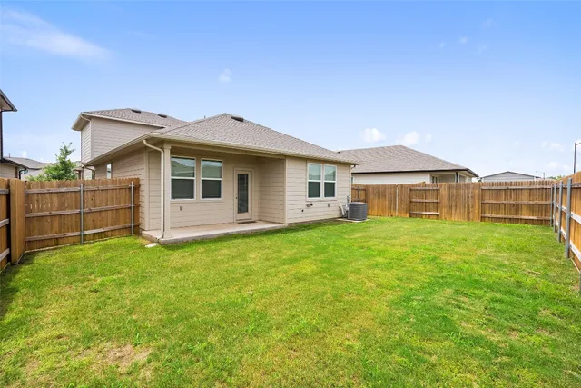 a view of a porch with a big yard