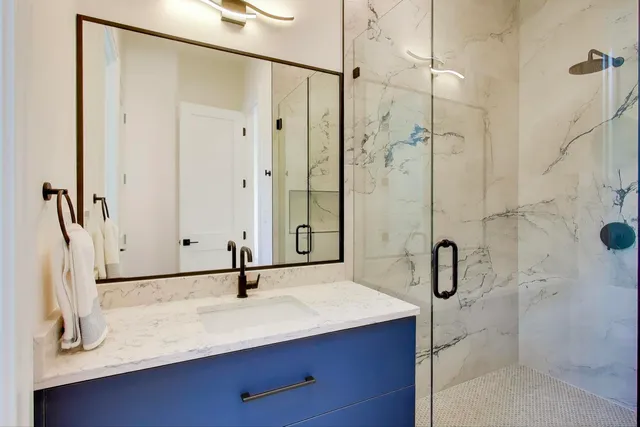 a view of hallway with a rug and a tub