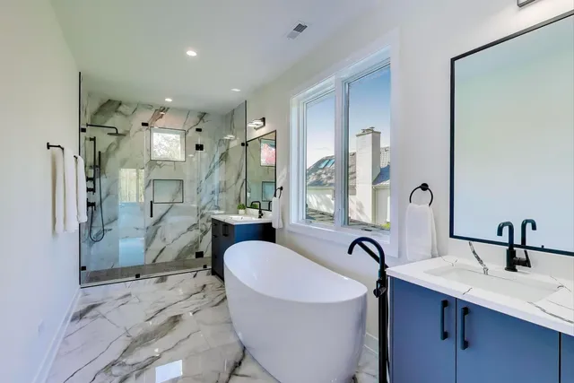 a view of a kitchen with a sink and a window