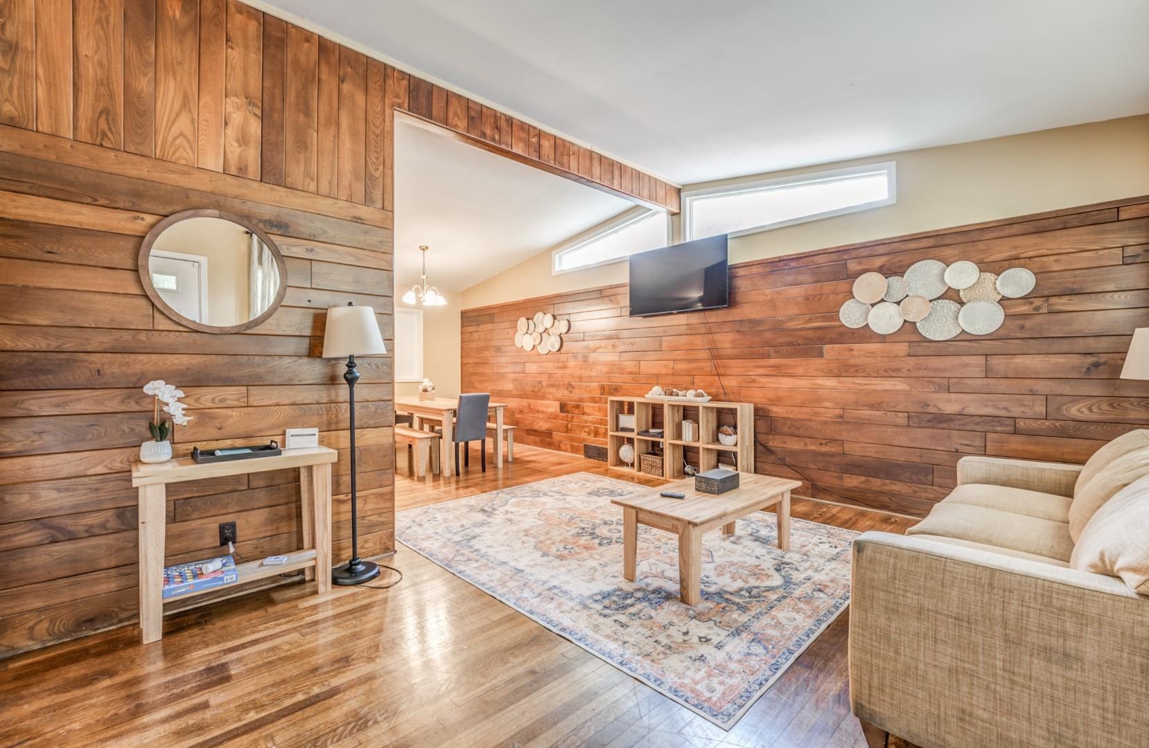 3661 McCorkle Road Memphis, TN 38116 - Photo 2 of 25 a living room with fireplace furniture and a wooden floor