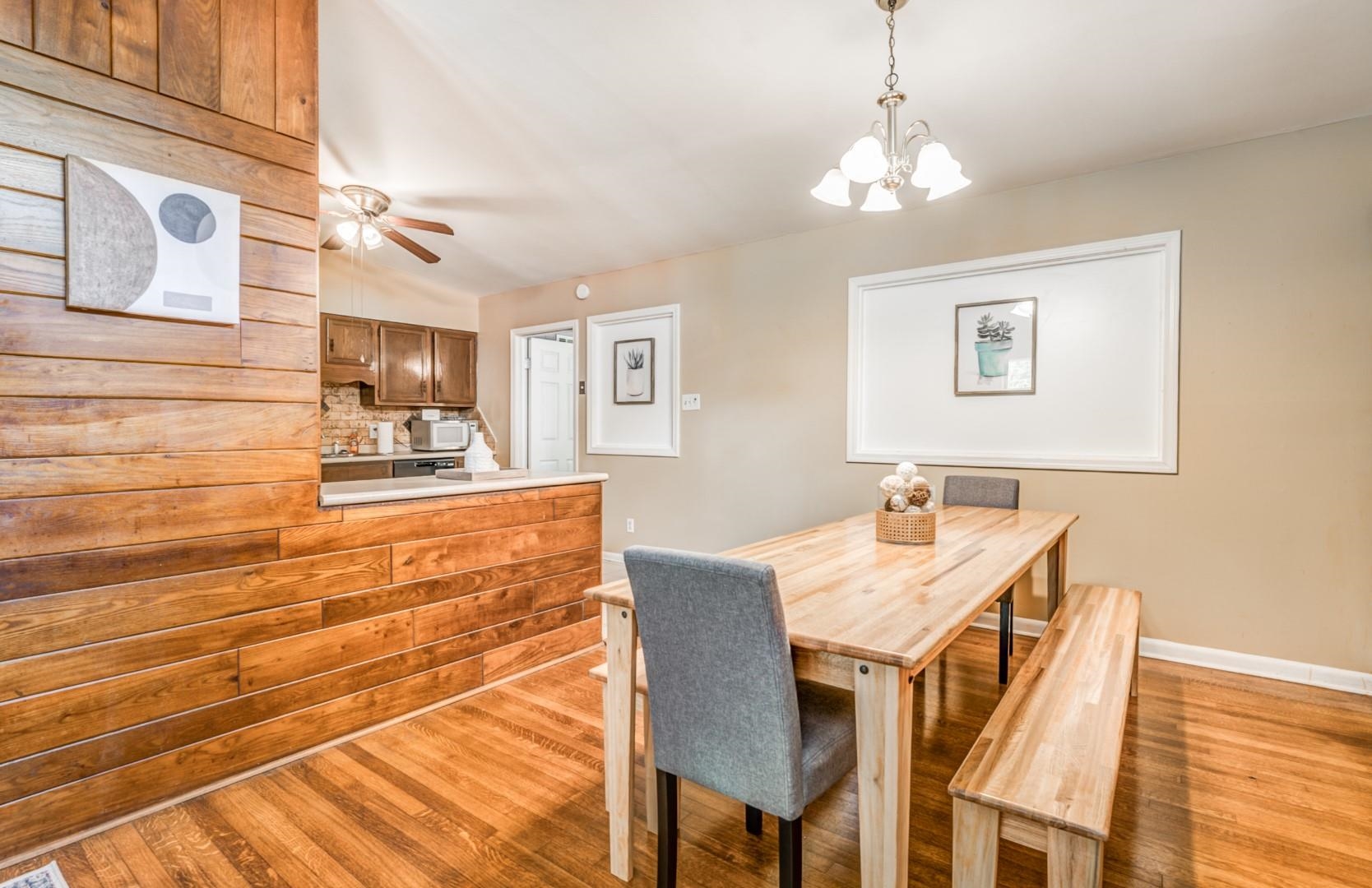 3661 McCorkle Road Memphis, TN 38116 - Photo 6 of 25 a view of a dining room with furniture and wooden floor