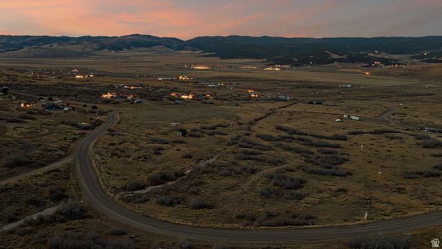 349 West Mountain View Road, Unit 349 Fairview, UT 84629 - Photo 26 of 26 Sweeping aerial landscape featuring distant mountain ranges and a winding unpaved road