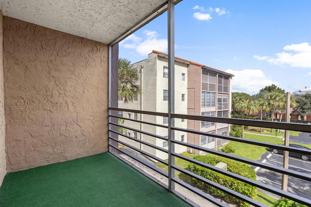 1830 Southwest 81st Avenue, Unit 4317 North Lauderdale, FL 33068 - Photo 15 of 22 a view of a building from a balcony
