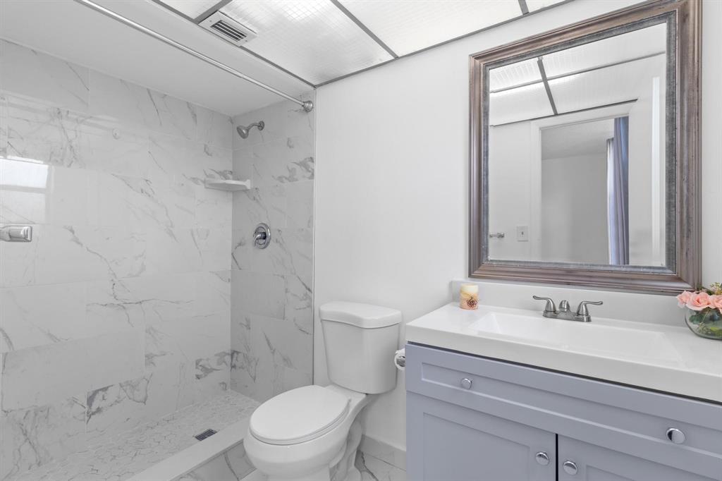 1830 Southwest 81st Avenue, Unit 4317 North Lauderdale, FL 33068 - Photo 16 of 22 a bathroom with a sink a toilet and shower