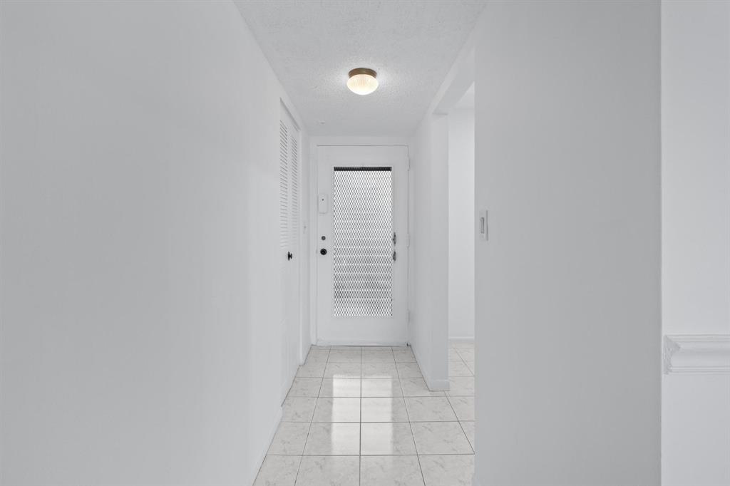 1830 Southwest 81st Avenue, Unit 4317 North Lauderdale, FL 33068 - Photo 3 of 22 a view of a hallway