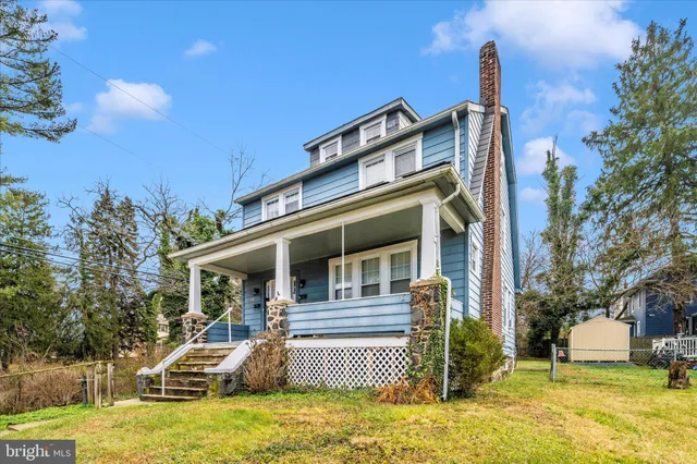 front view of a house with a patio