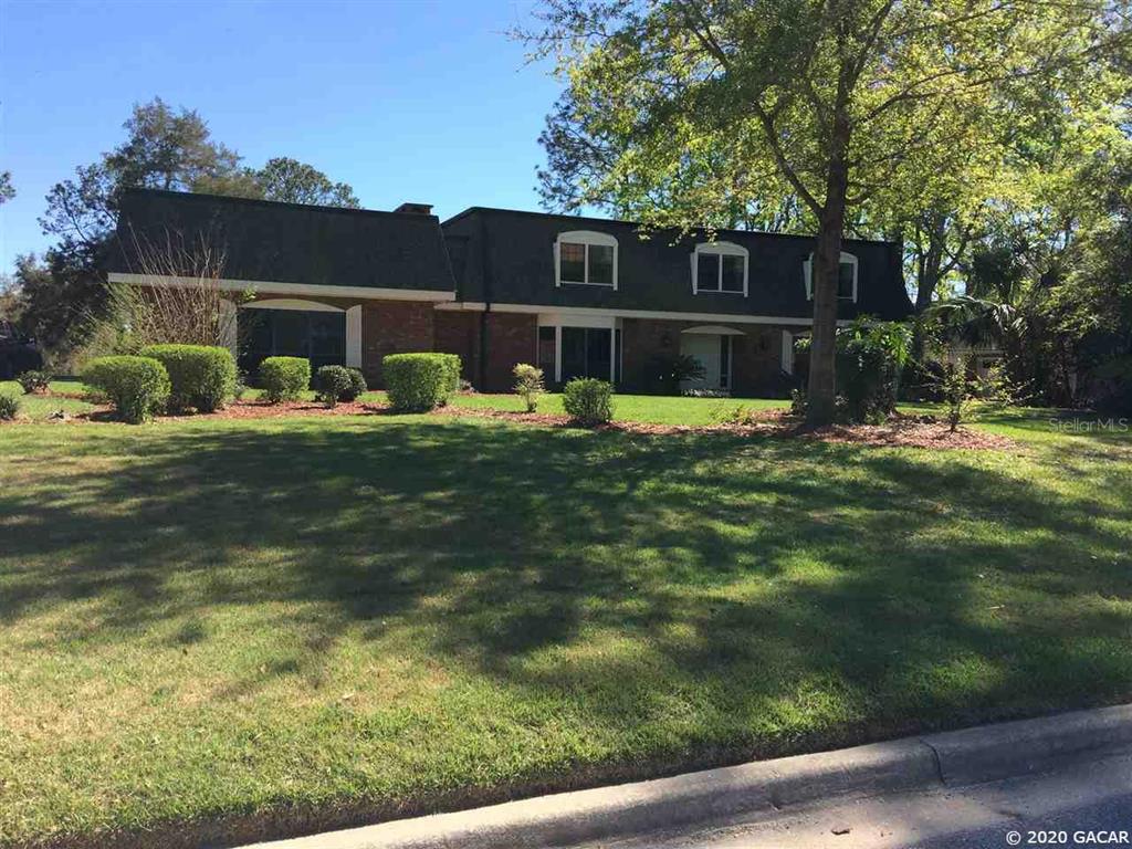 3225 Southwest 62nd Lane Gainesville, FL 32608 - Photo 1 of 1 a view of a house with backyard and sitting area