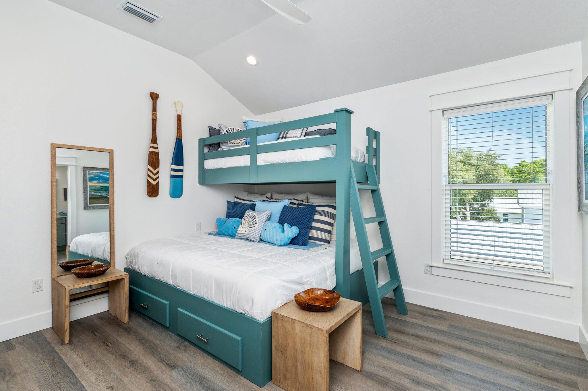 54 North Gulf Drive Santa Rosa Beach, FL 32459 - Photo 51 of 67 a bedroom with a bed and wooden floor