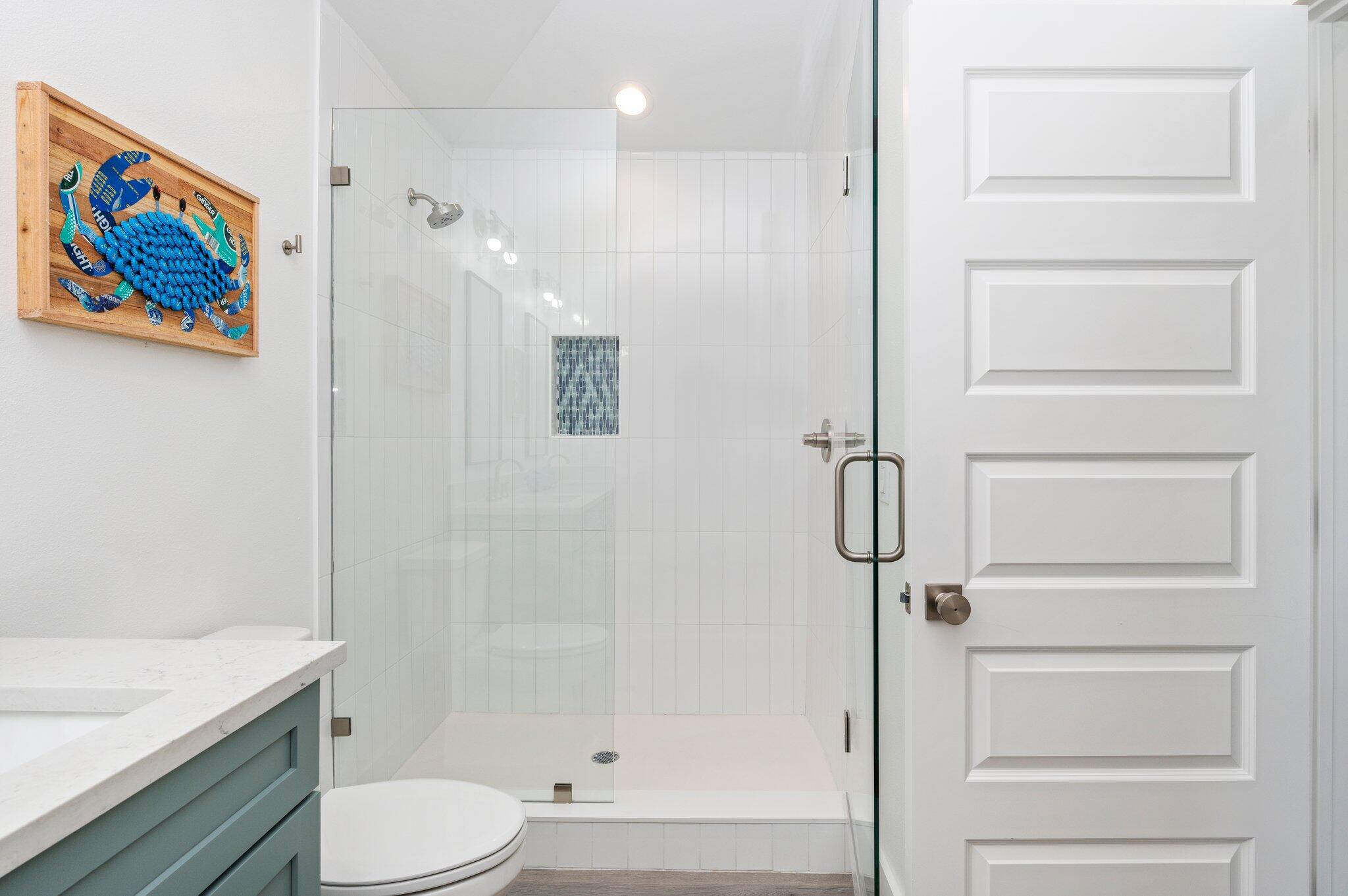 54 North Gulf Drive Santa Rosa Beach, FL 32459 - Photo 54 of 67 a bathroom with a toilet a sink and a shower