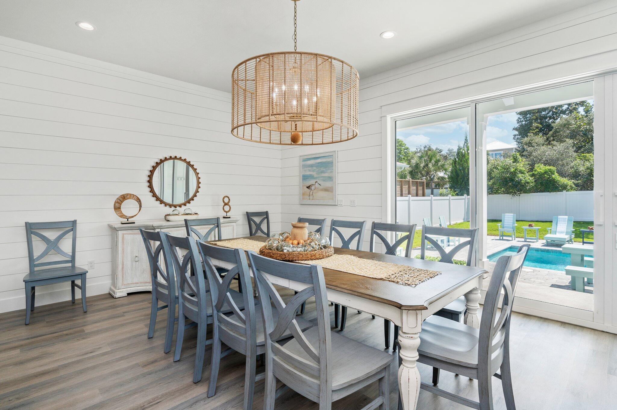54 North Gulf Drive Santa Rosa Beach, FL 32459 - Photo 10 of 67 a view of a dining room with furniture window and wooden floor