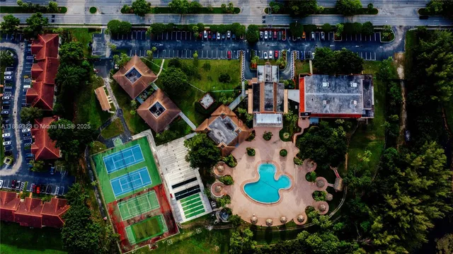 a view of balcony with wooden floor and fence