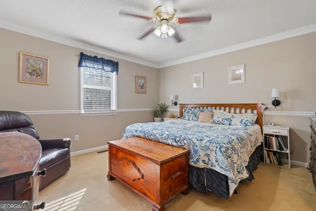 a spacious bathroom with a sink and a mirror