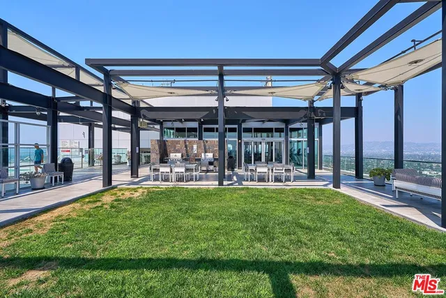 a view of swimming pool with a patio