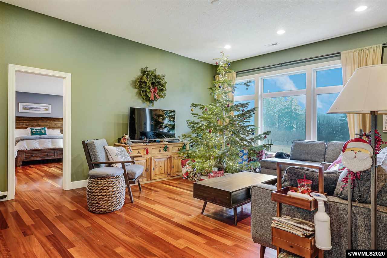 2065 Southeast Godsey Road Dallas, OR 97338 - Photo 14 of 34 a living room with furniture and a flat screen tv