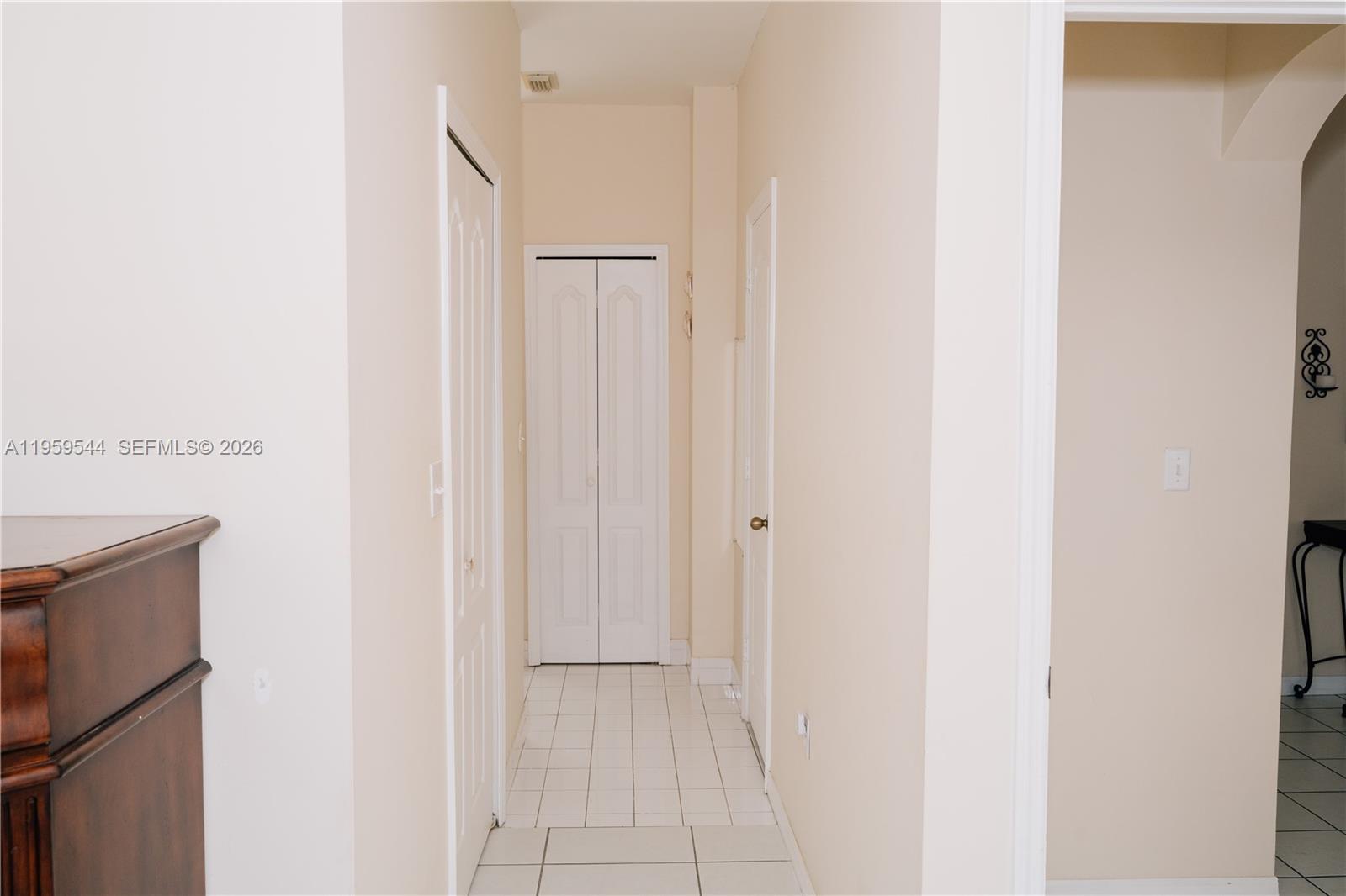16158 Southwest 68th Terrace Miami, FL 33193 - Photo 26 of 56 Hallway from Primary Bedroom to Primary Bathroom