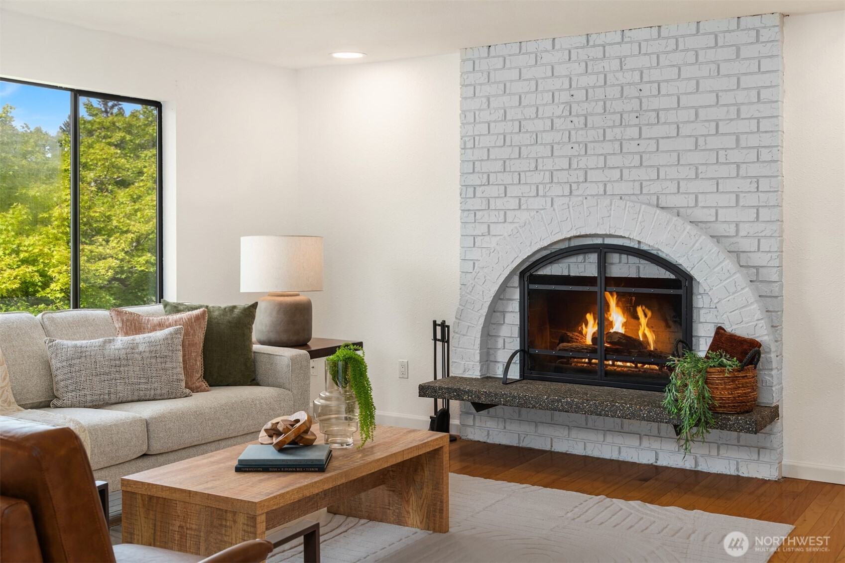 418 212th Street Southwest Bothell, WA 98021 - Photo 7 of 40 a living room with furniture and a fireplace