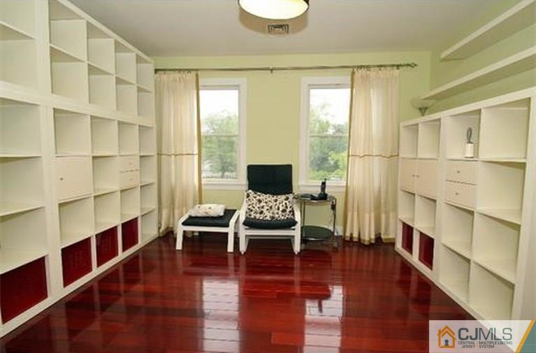 28 Chandler Road Edison, NJ 08820 - Photo 21 of 25 a bedroom with furniture and window
