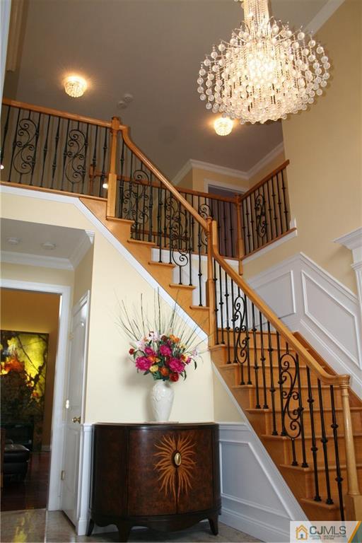 28 Chandler Road Edison, NJ 08820 - Photo 4 of 25 a view of entryway with wooden floor