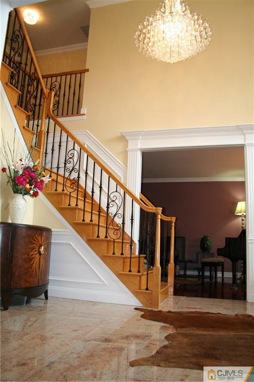 28 Chandler Road Edison, NJ 08820 - Photo 5 of 25 a view of entryway and hall