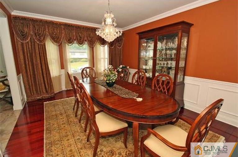 28 Chandler Road Edison, NJ 08820 - Photo 7 of 25 a view of a dining room with furniture and window