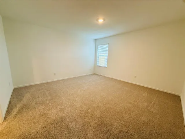an empty room with a natural light