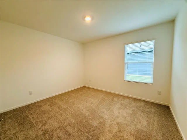 an empty room with a workbench