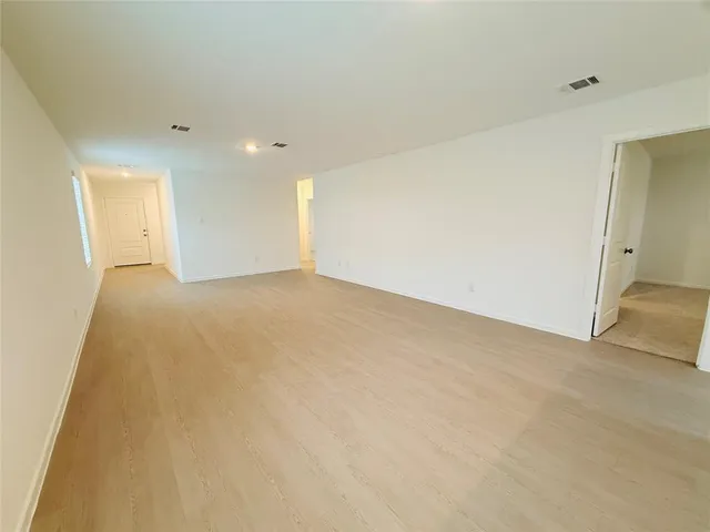 an empty room with an entryway