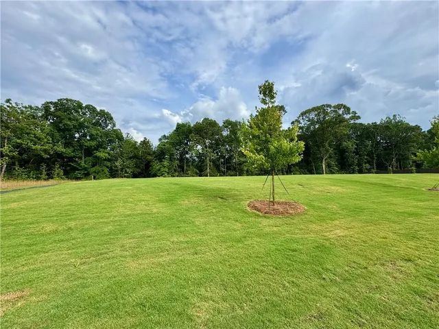 a front view of a building with street view
