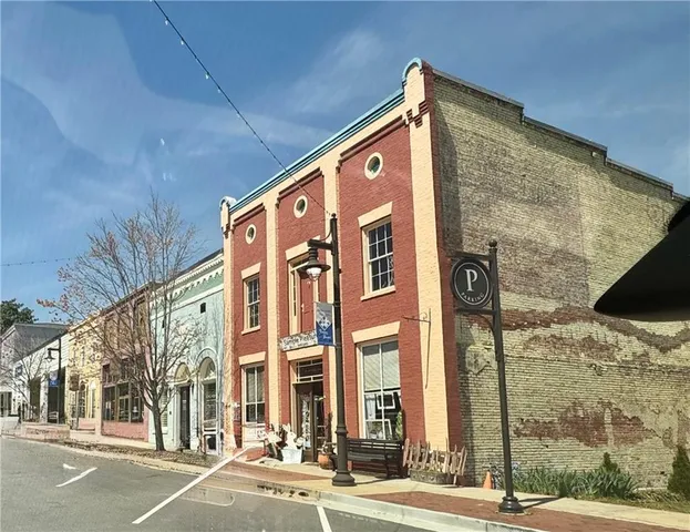 a view of entryway with a table and chairs
