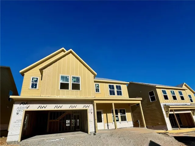 a view of a room with wooden walls