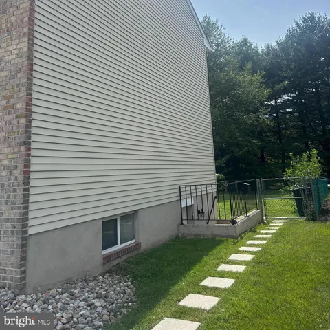 a view of a deck with a yard