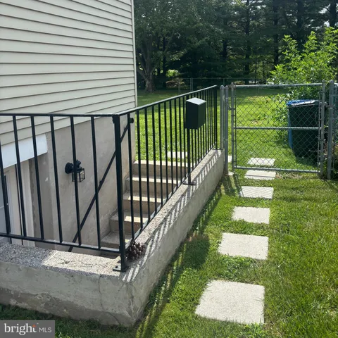 a view of a backyard with a garden