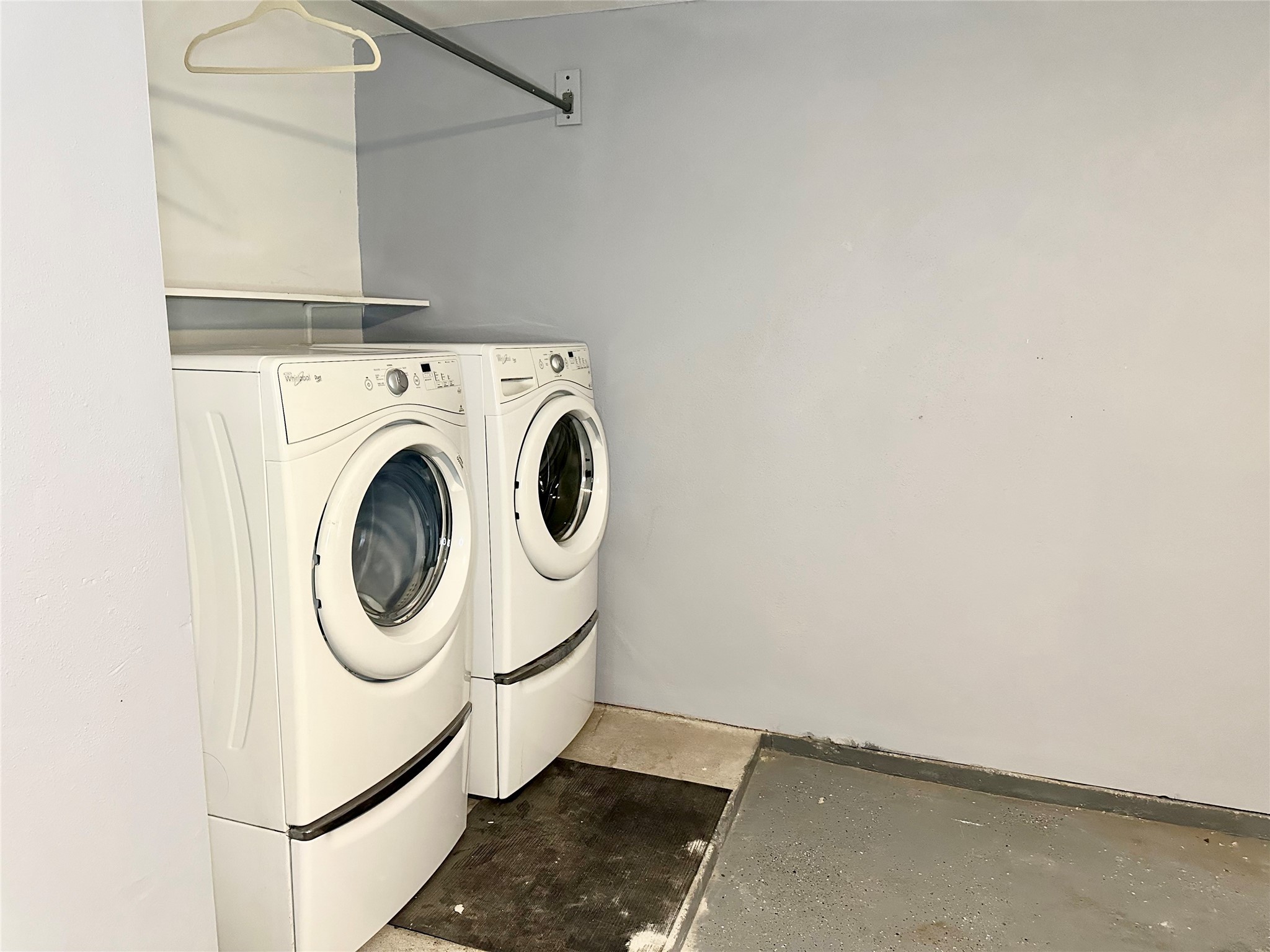 3200 South Gessner Road, Unit 330 Houston, TX 77063 - Photo 11 of 27 a utility room with dryer and washer