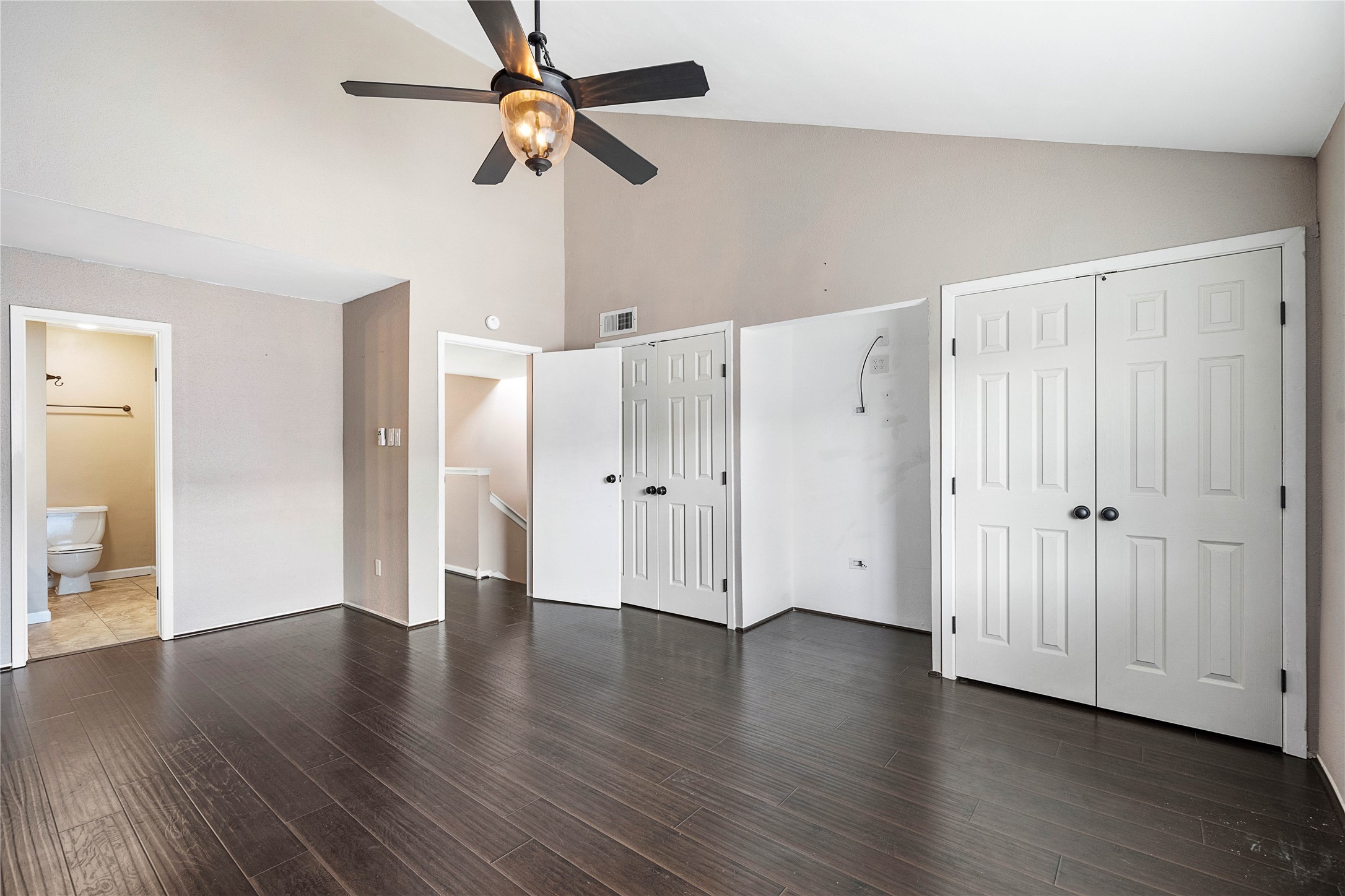 3200 South Gessner Road, Unit 330 Houston, TX 77063 - Photo 13 of 27 a view of an empty room with wooden floor